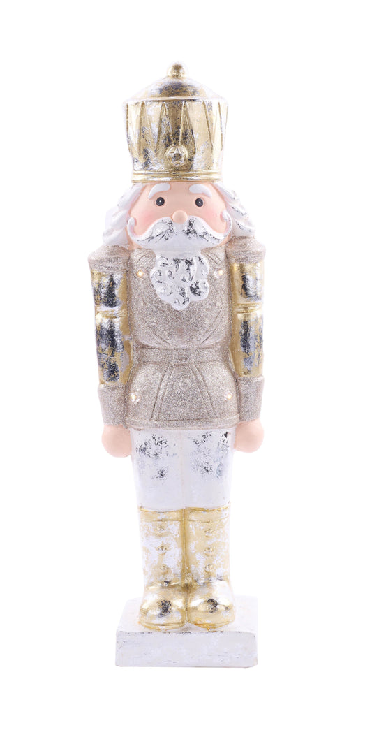 XN435401 | 21.25"H x 6.5"L | MGO Nutcracker | Beige/Gold/White